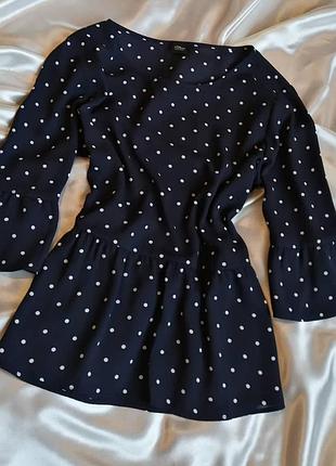 Гарненька блуза в горохок