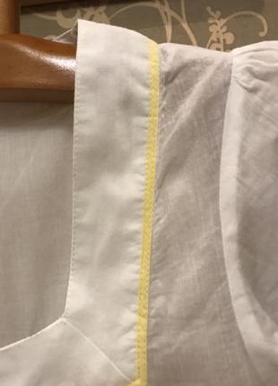 Очень красивая и стильная брендовая блузка белого цвета..100% коттон 20.