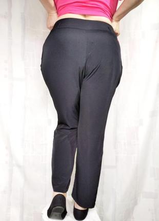 Шелковые брюки с широким поясом и карманами5 фото
