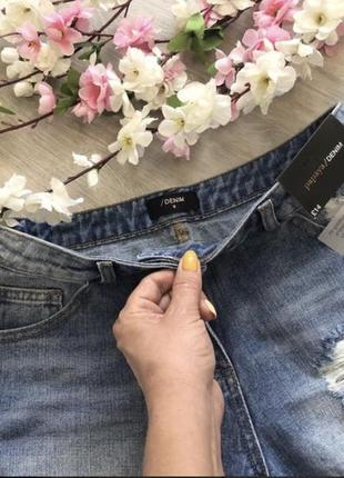 Стильный джинсовые рваные шорты со шнуровкой3 фото