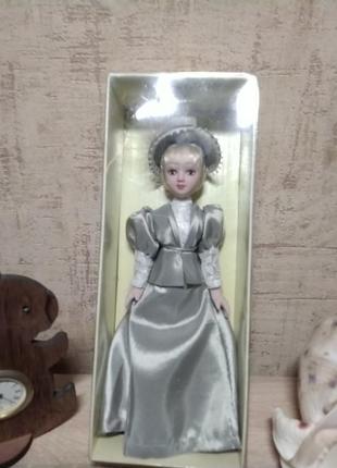 Красива порцелянова лялечка з колекції пані епохи.1 фото