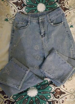 Стильные джинсы под бренд,отличное качество, размер л.2 фото