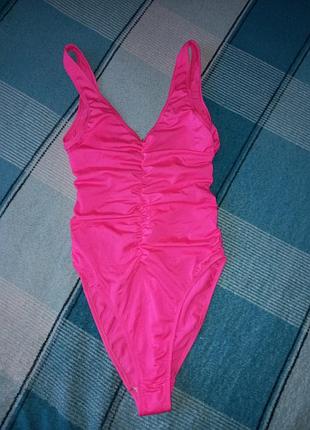 Яскравий суцільний купальник