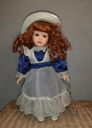 Кукла фарфоровая коллекционная1 фото