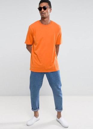 Помаранчева футболка