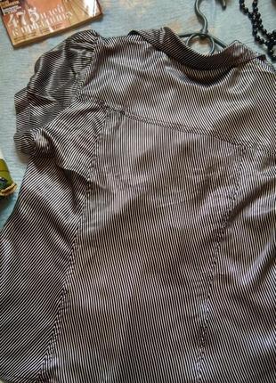 Лёгкая летняя женская блуза с ремешком.2 фото