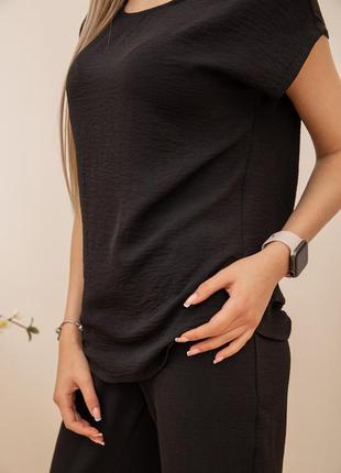 Костюм женский повседневный футболка и штаны черный цвет6 фото