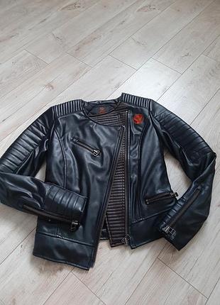 Косуха жіноча