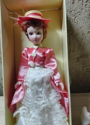 Красивая фарфоровая куколка из коллекции дамы эпохи.2 фото
