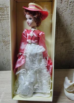 Красивая фарфоровая куколка из коллекции дамы эпохи.1 фото