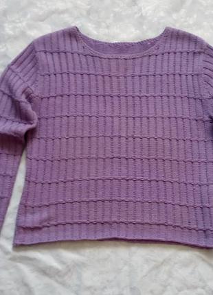 Кофточка ажурной машинной вязки.