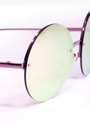 Модні жіночі сонцезахисні окуляри.3 фото