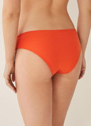 Яркий красно-оранжевый текстурированный стильный купальник2 фото