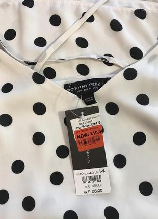 Дуже гарна і стильна брендовий блузка в горох.