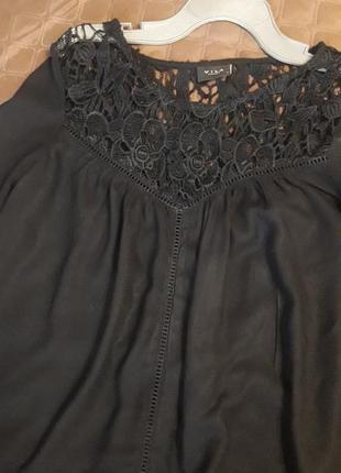 Блуза черного цвета из вискозы5 фото