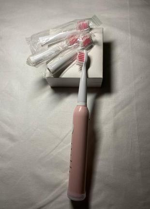 Електрична зубна щітка1 фото