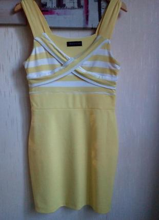 Красивого желтого цвета трикотажное платьице1 фото