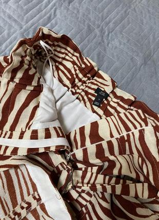 Юбка с защипами на талии с поясом и карманами в принт зебра8 фото