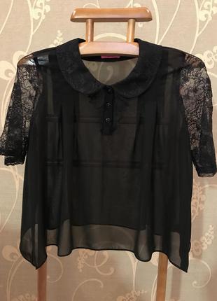 Очень красивая и стильная брендовая блузка чёрного цвета.