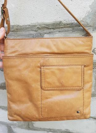 Двусторонняя кожаная сумка-планшет британского бренда tula