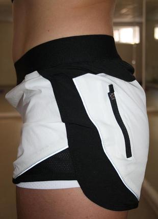 Женские спортивные шорты under armour5 фото