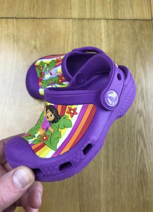 Детские босоножки crocs dora1 фото