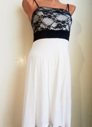 Чудове біле плаття з чорним мереживом6 фото
