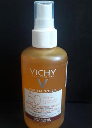Vichy capital soleil solar protective water spf50 с бета-каротином.