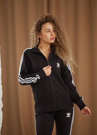 Спортивний жіночий костюм unis adidas чорний з білими лампасами на прямий блискавки змійки4 фото