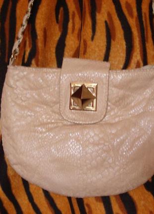 Сумка бежево-золотистого кольору 55% поліестер,45%бавовна.