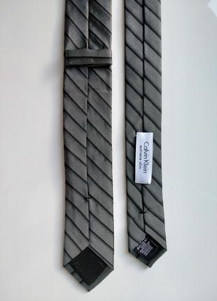 Вузька краватка в смужку сірий від calvin klein extreme slim