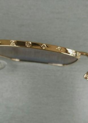 Louis vuitton очки унисекс солнцезащитные в золотом металле с сине бежевым градиентом6 фото