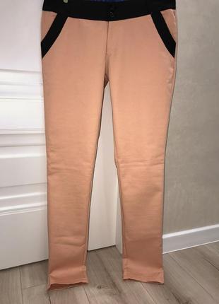 Штани ніжно персикового кольору 🍑1 фото