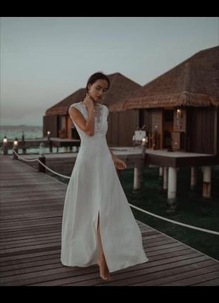 Красиве, ніжне весільну сукню кольору айворі.4 фото