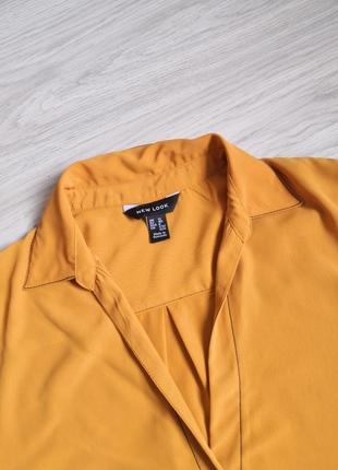 Темно жёлтая лёгкая блуза с удлиненной спинкой3 фото