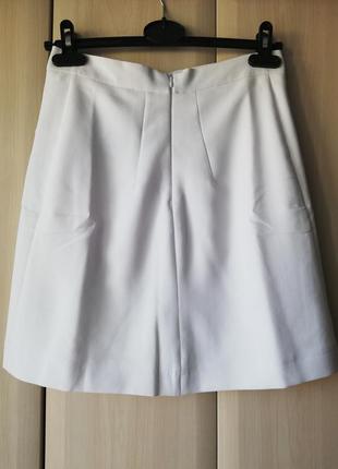 Белая юбка с накладными карманами летняя юбка7 фото