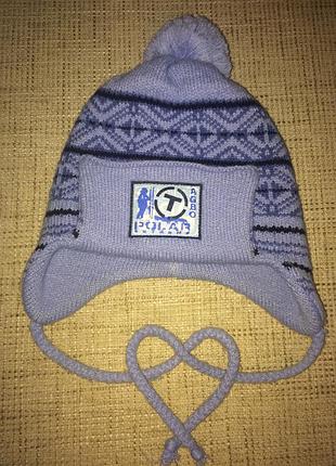 Теплая зимняя шапка
