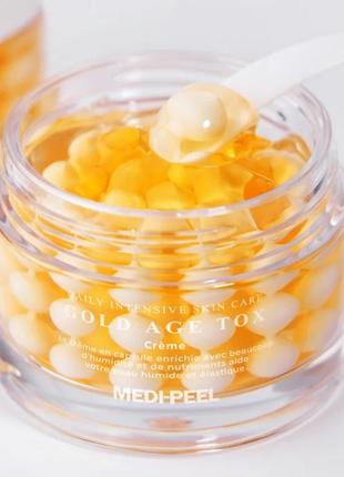 Антивозрастной капсульный крем с экстрактом шелкопряда medi-peel gold age tox cream1 фото