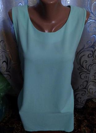Бирюзовая блузка