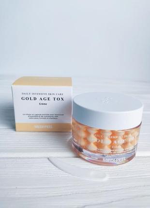 Антивозрастной крем с экстрактом золотого шевкопряда medi-peel gold age tox cream 50 мл1 фото