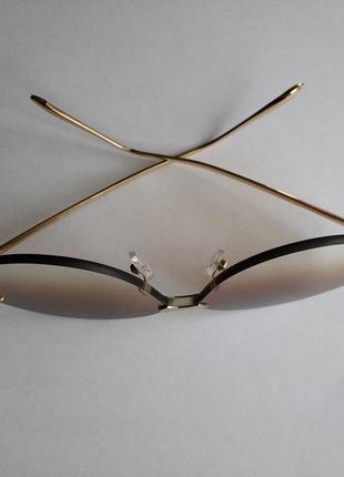 Стильні жіночі сонцезахисні окуляри6 фото