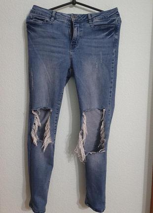 Рваные джинсы5 фото