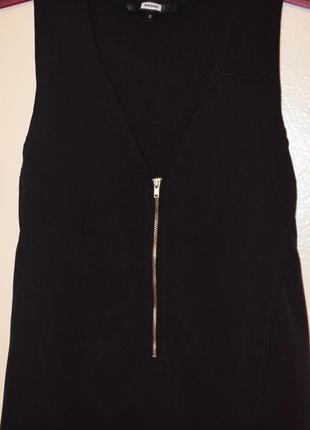 Лёгенькая блузка с серебристым замочком1 фото