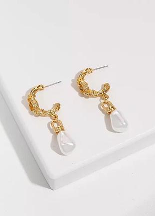 Красивые серьги необычной формы