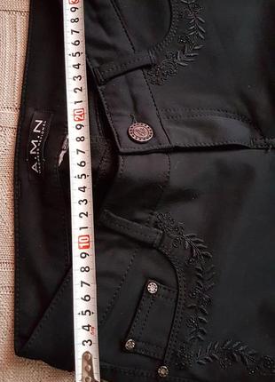 Фирменые черные брюки бренда a.m.n4 фото