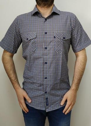 Стильная, хлопковая, летняя классическая рубашка с двумя карманами.1 фото