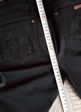 Фирменые черные брюки бренда a.m.n7 фото