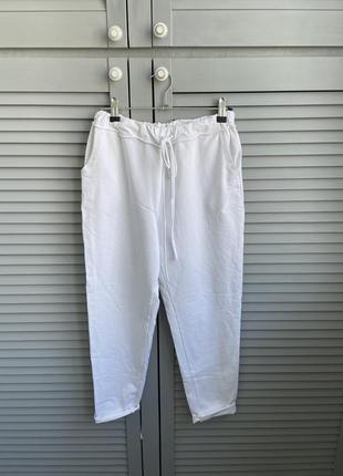 Белые спортивные брюки на лето1 фото