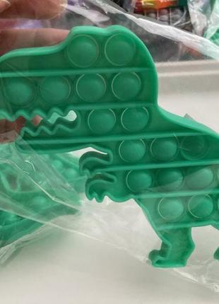 Динозавр зелений поп іт іграшка пупырка бульбашки