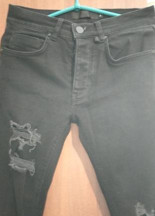 Рваные джинсы цвет черный .7 фото